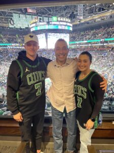 Dave with his kids at a Celtics game