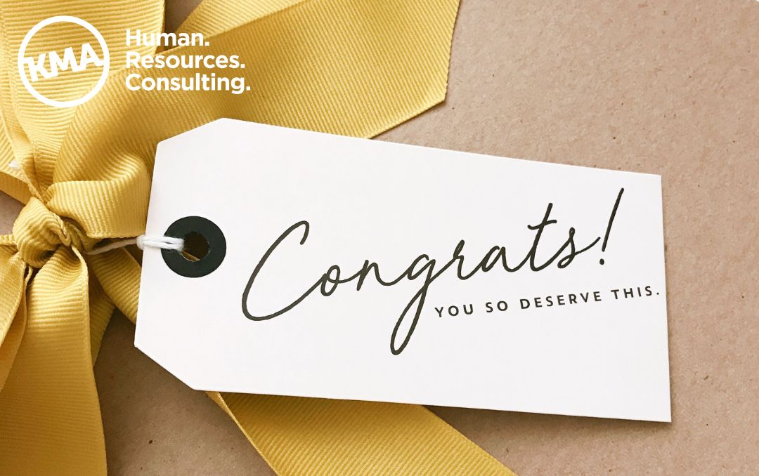 A wrapped package with card that reads: Congrats! You so deserve this.