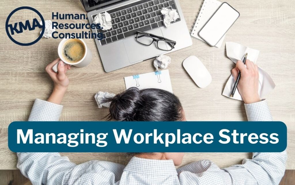 Women sitting with her head down with a messy desk with title "managing workplace stress"