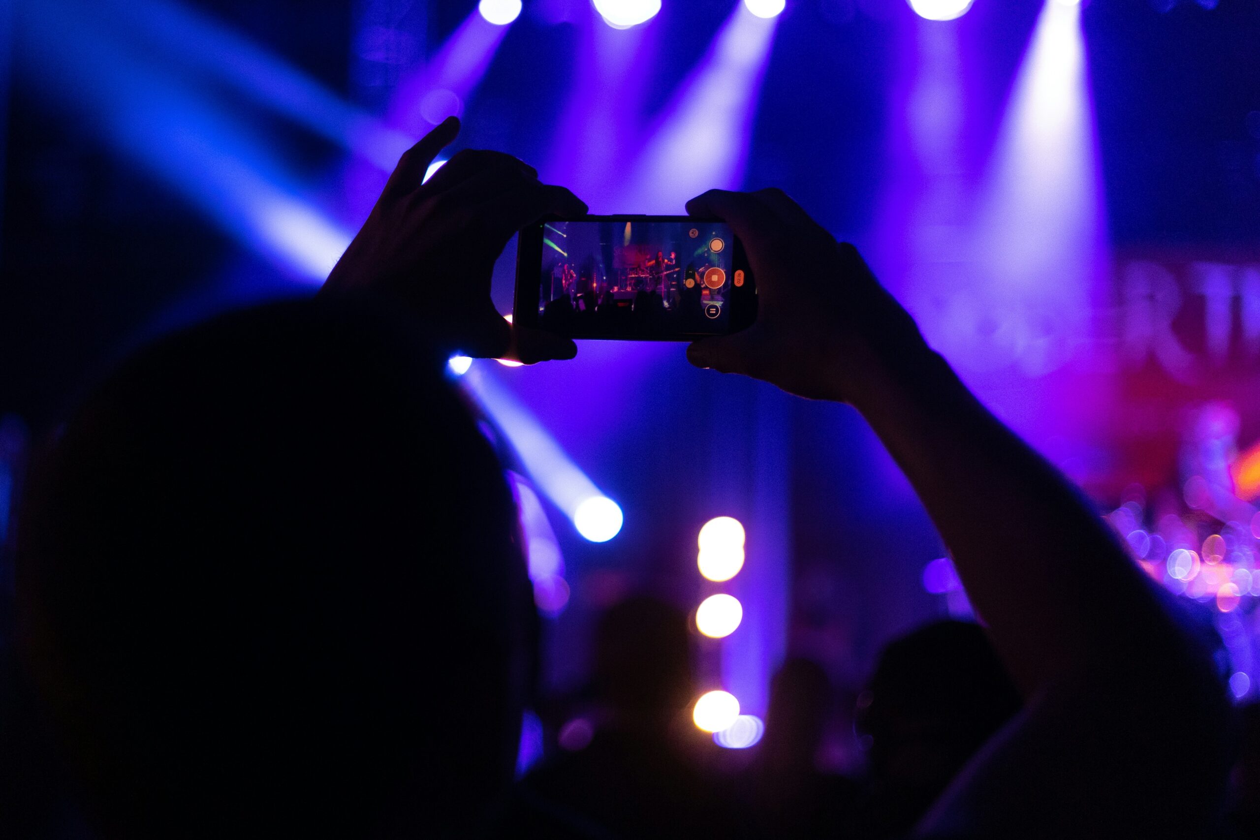 photo of an iPhone at a concert